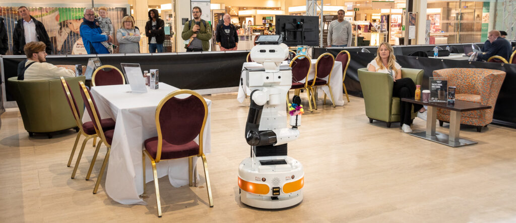TIAGo robot during the Coffee Shop episode of the Smart Cities Challenge 2023